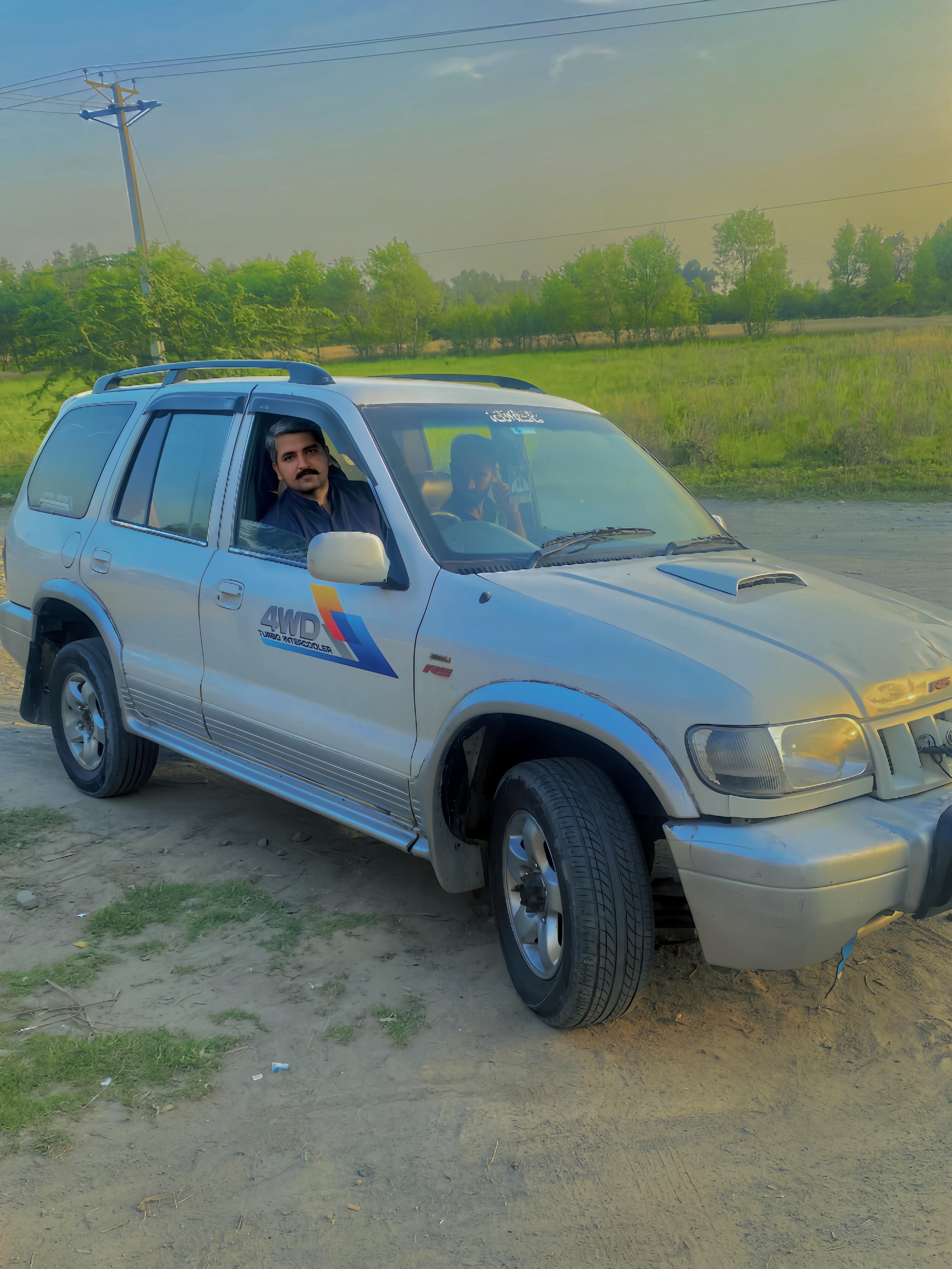 Sami Bajwa with his vehicle